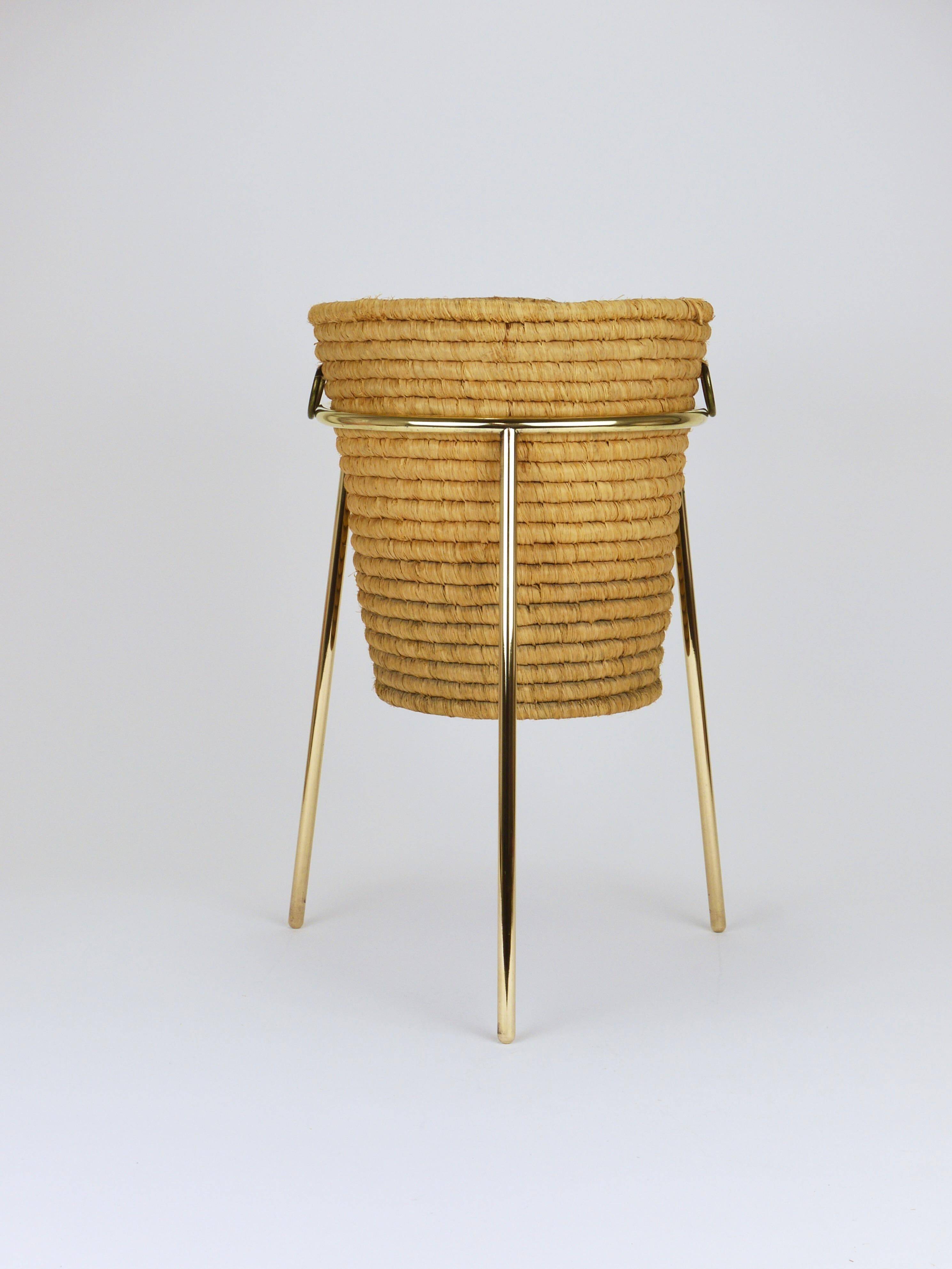 Carl Auböck II paper basket in raffia and brass, umbrella stand, 1950s