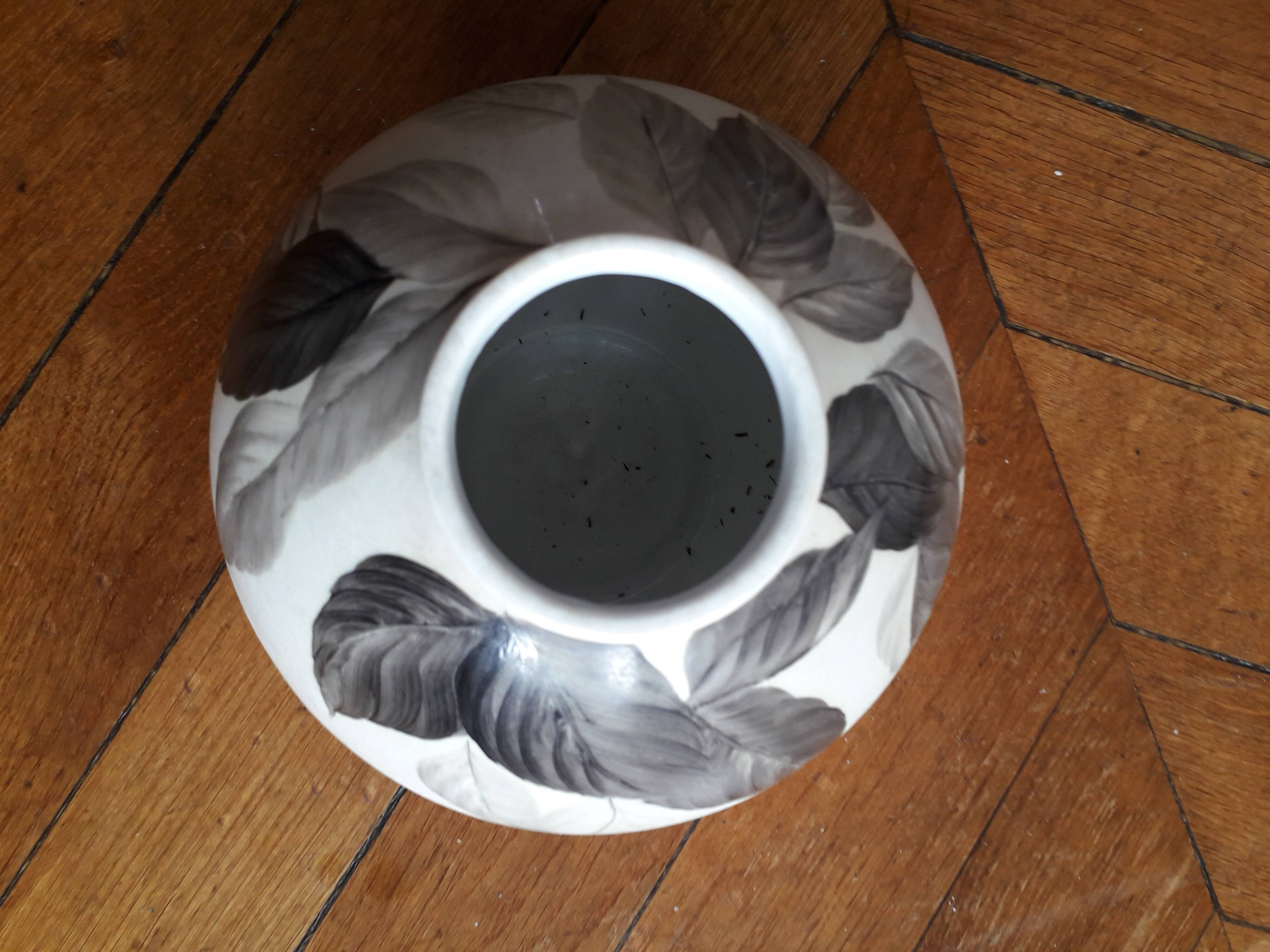 Vintage vase with plant decoration signed