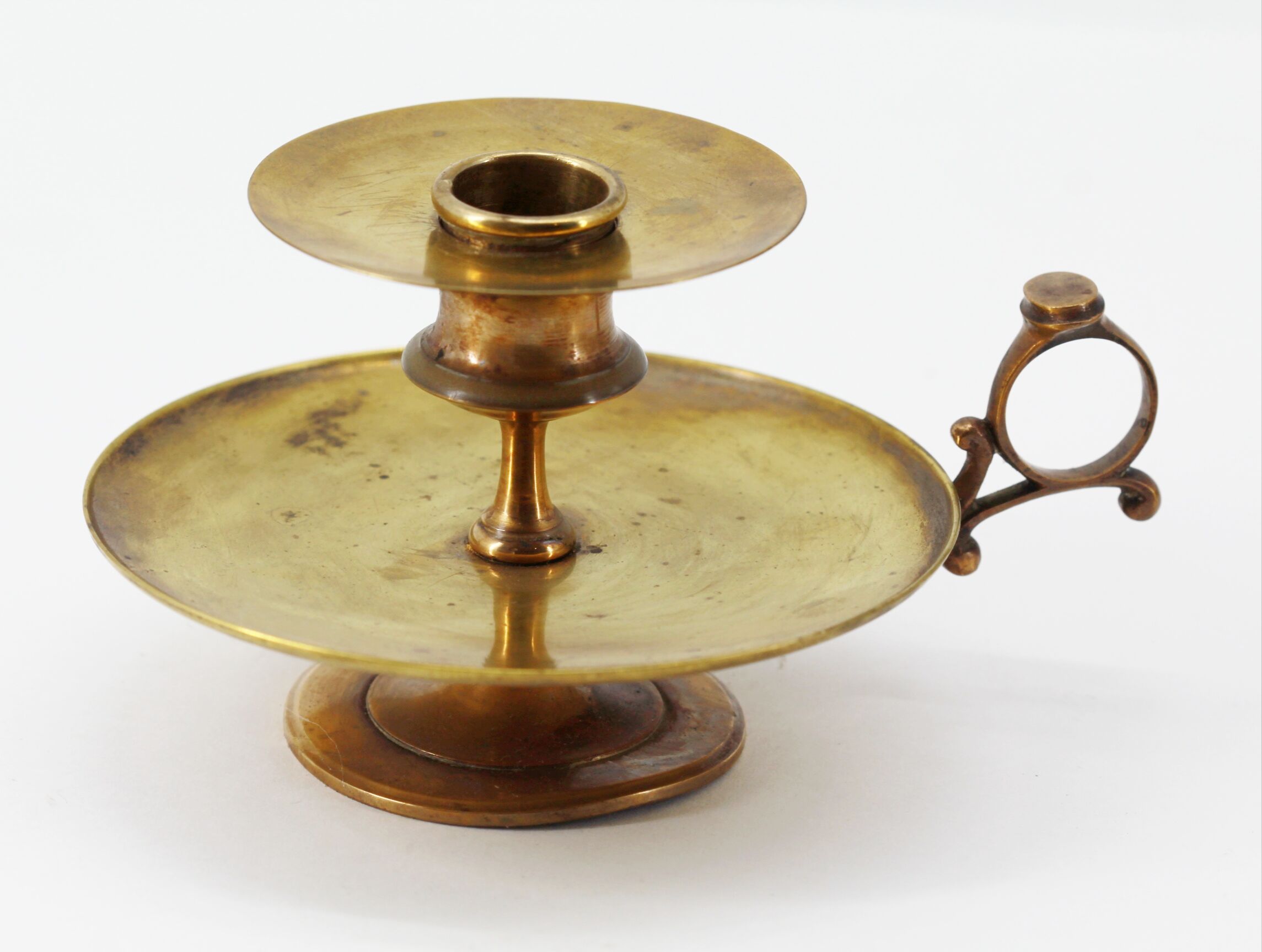 Brass hand candle holder