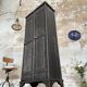 Strafor double-door corrugated iron cloakroom, circa 1920.