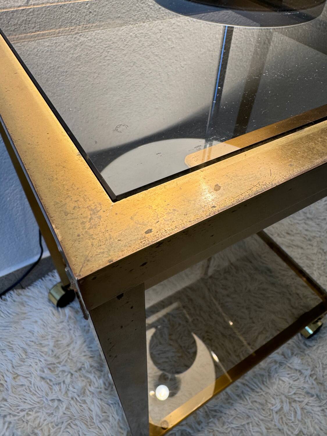 Brass rolling trolley with smoked glass from the 70s