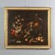 Old painting of still life with flowers, fruits, and birds from the 18th century.