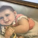 Old frame with a baby