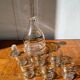 Gold-rimmed decanter and liqueur glass service