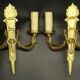 Pair of torchand and swan sconces, Empire style