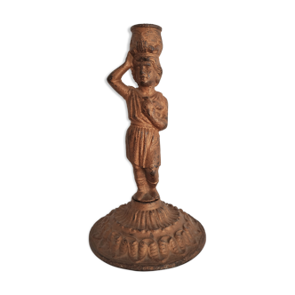 19th century candlestick with water-carrying character
