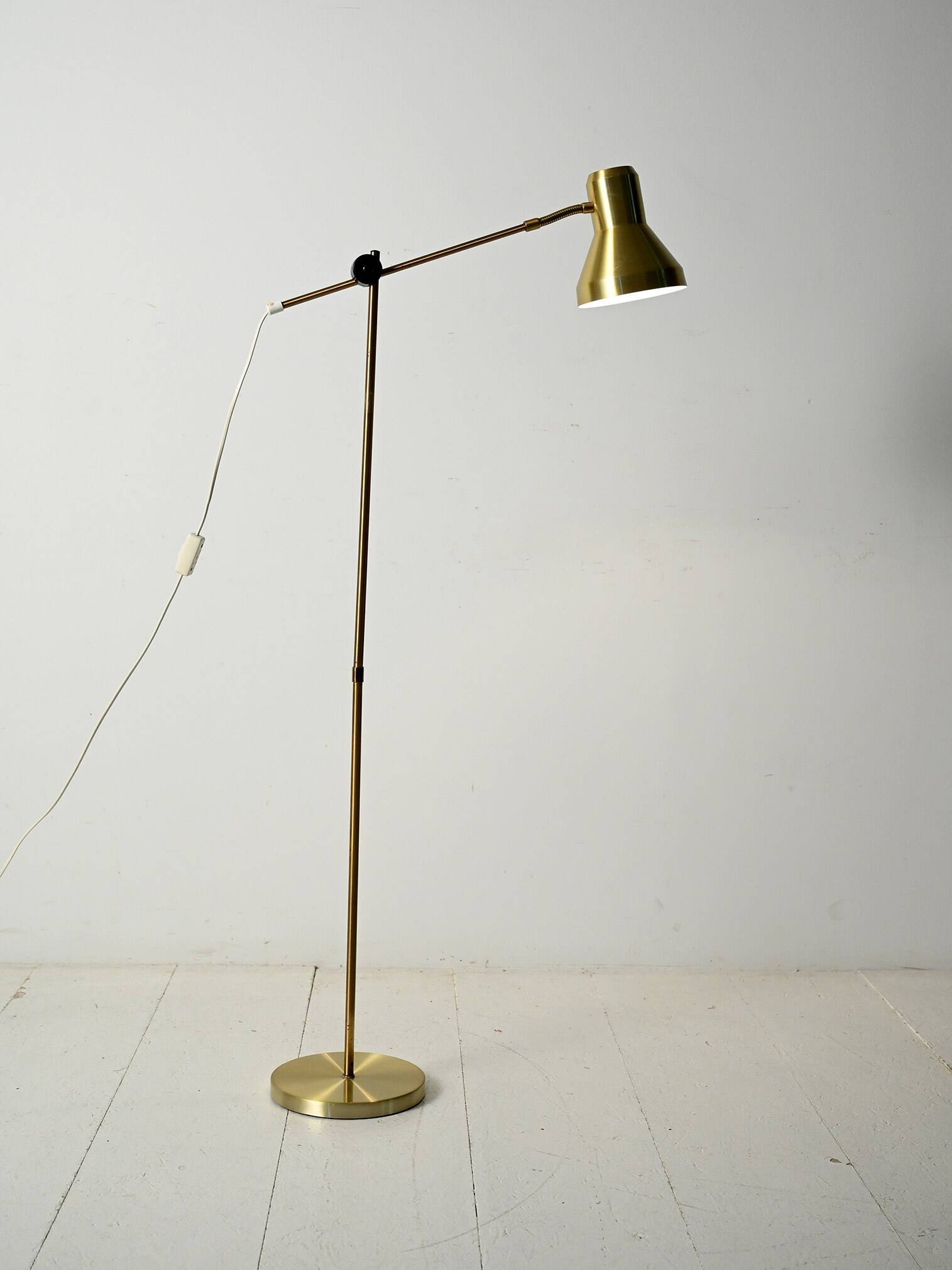 Scandinavian brass floor lamp with adjustable arm