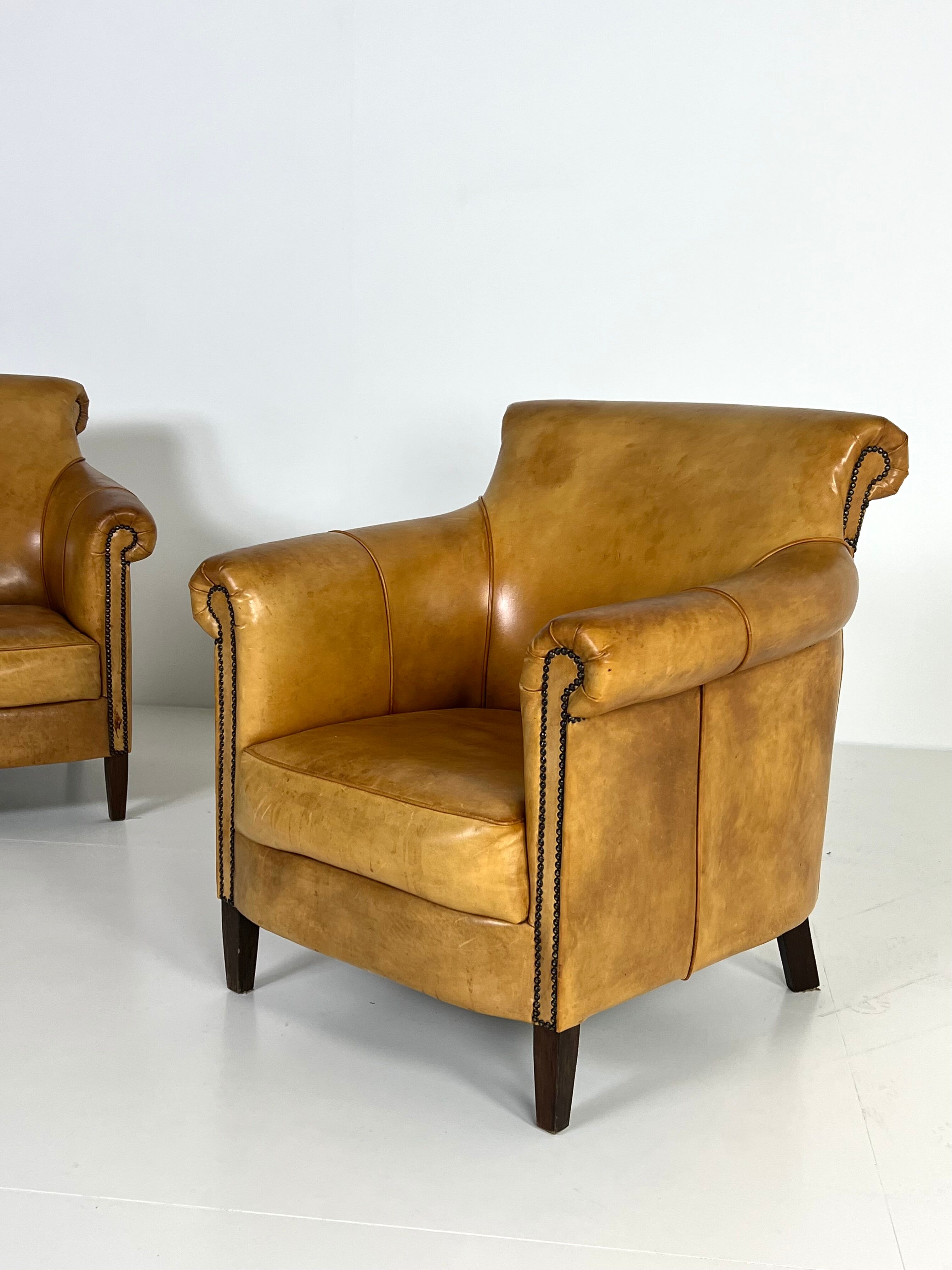 Ensemble de 2 fauteuils club en cuir