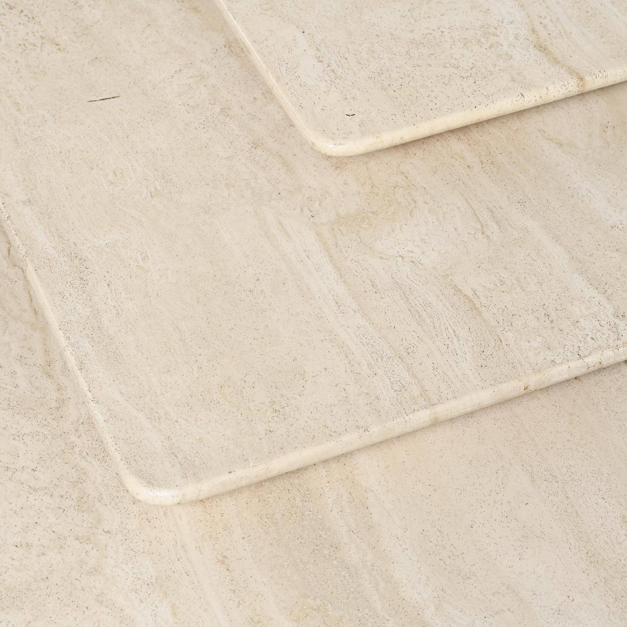 Set of three nesting tables in travertine, Italy circa 1970.