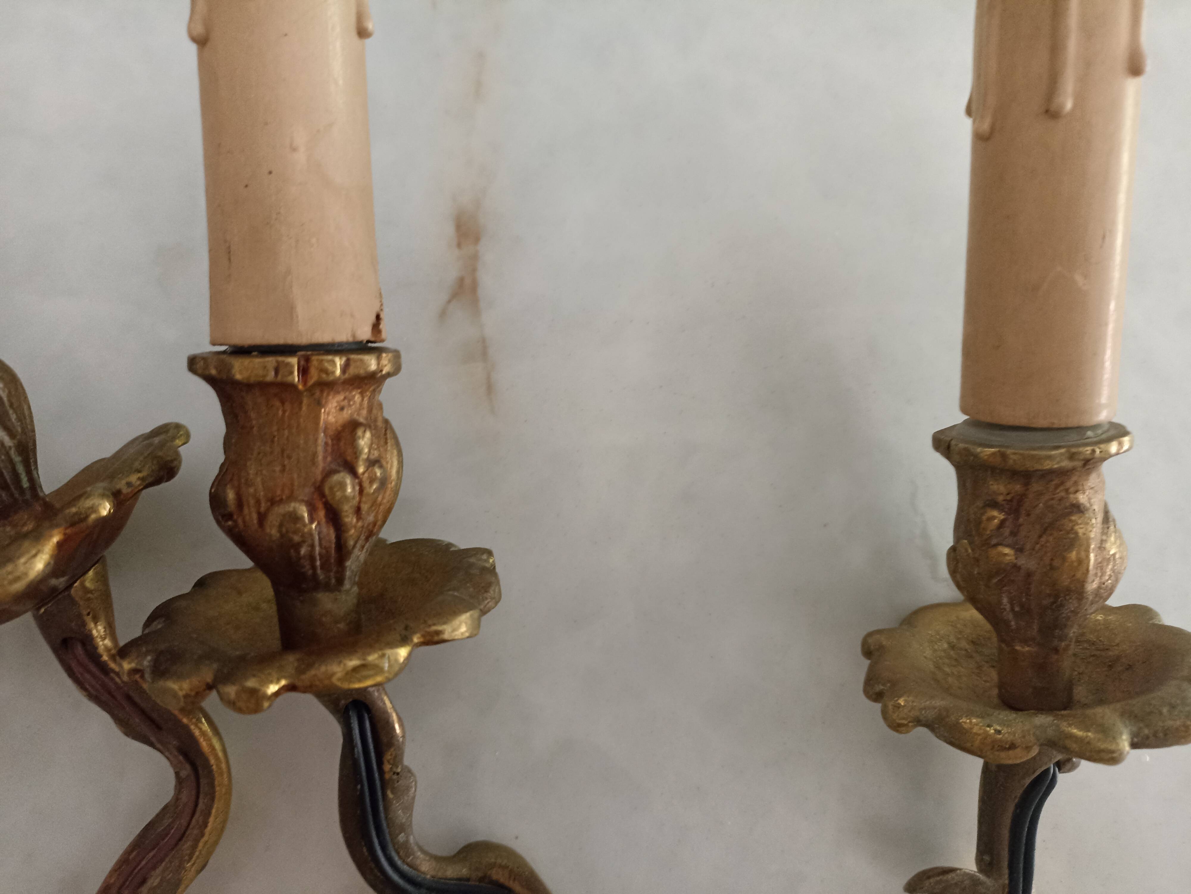 Brass candlestick wall lamps