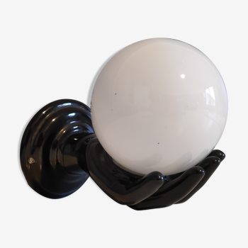 Black ceramic handand white opaline ball sconce