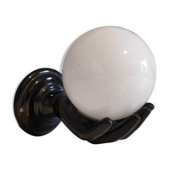 Black ceramic handand white opaline ball sconce
