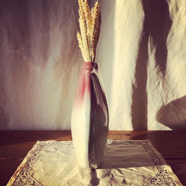 Old pink enamelled vase