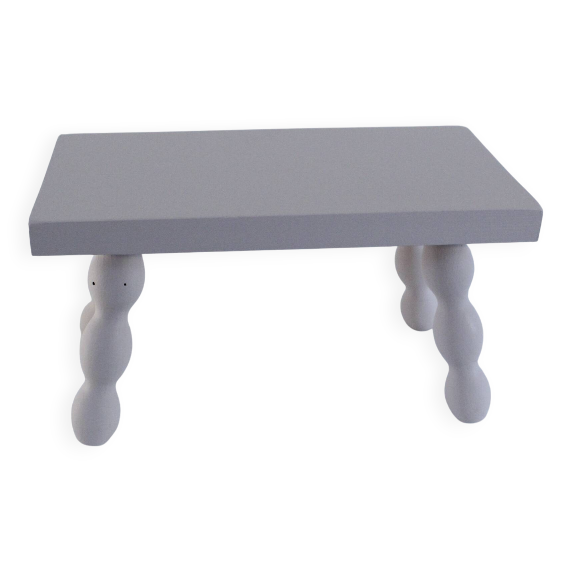 Small vintage wooden bench renovated in pinkish beige