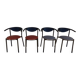 4 gondola-style chairs with a sturdy metal frame and faux leather.