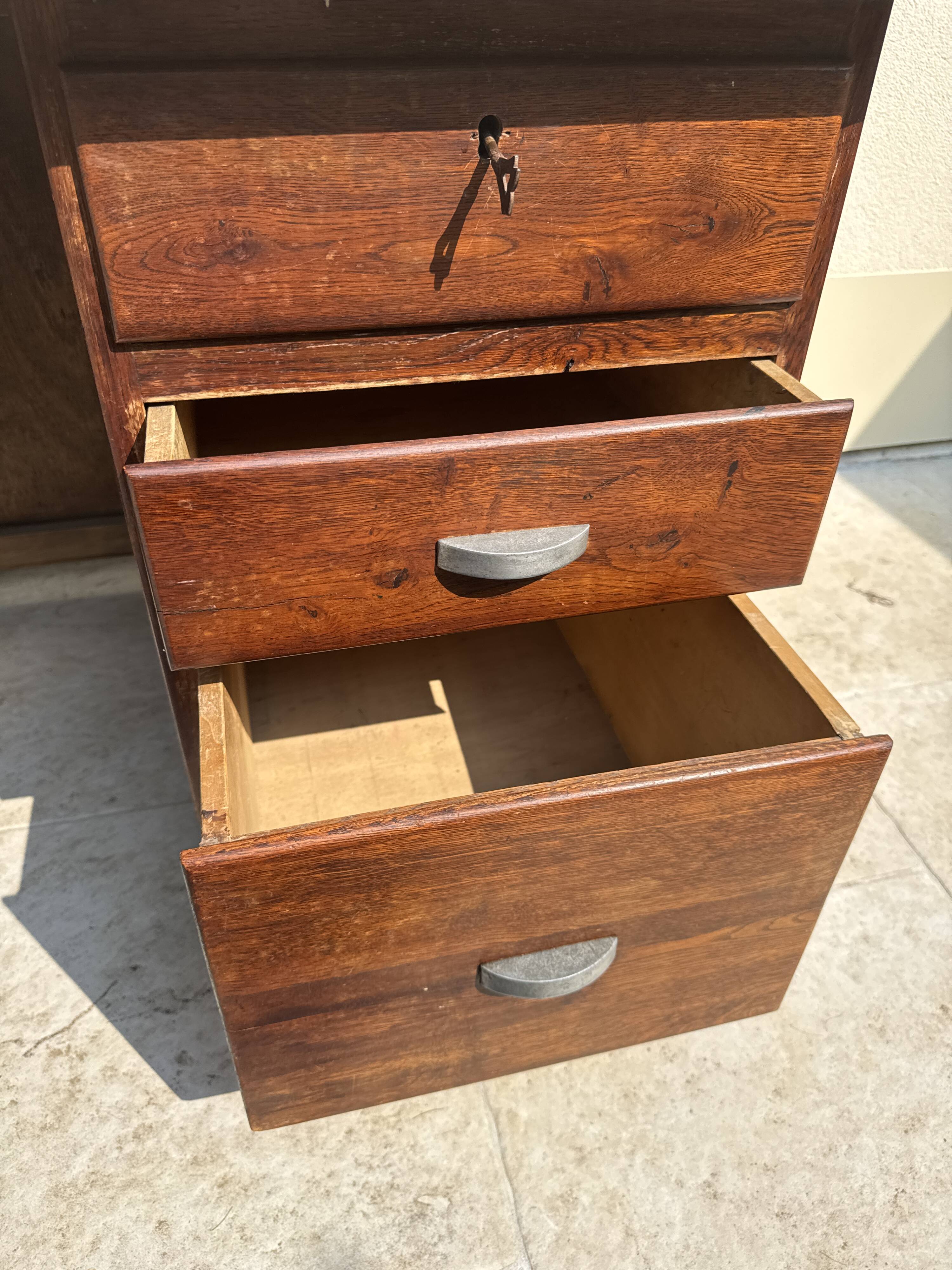 Modernist desk in wood and green moleskin upholstery