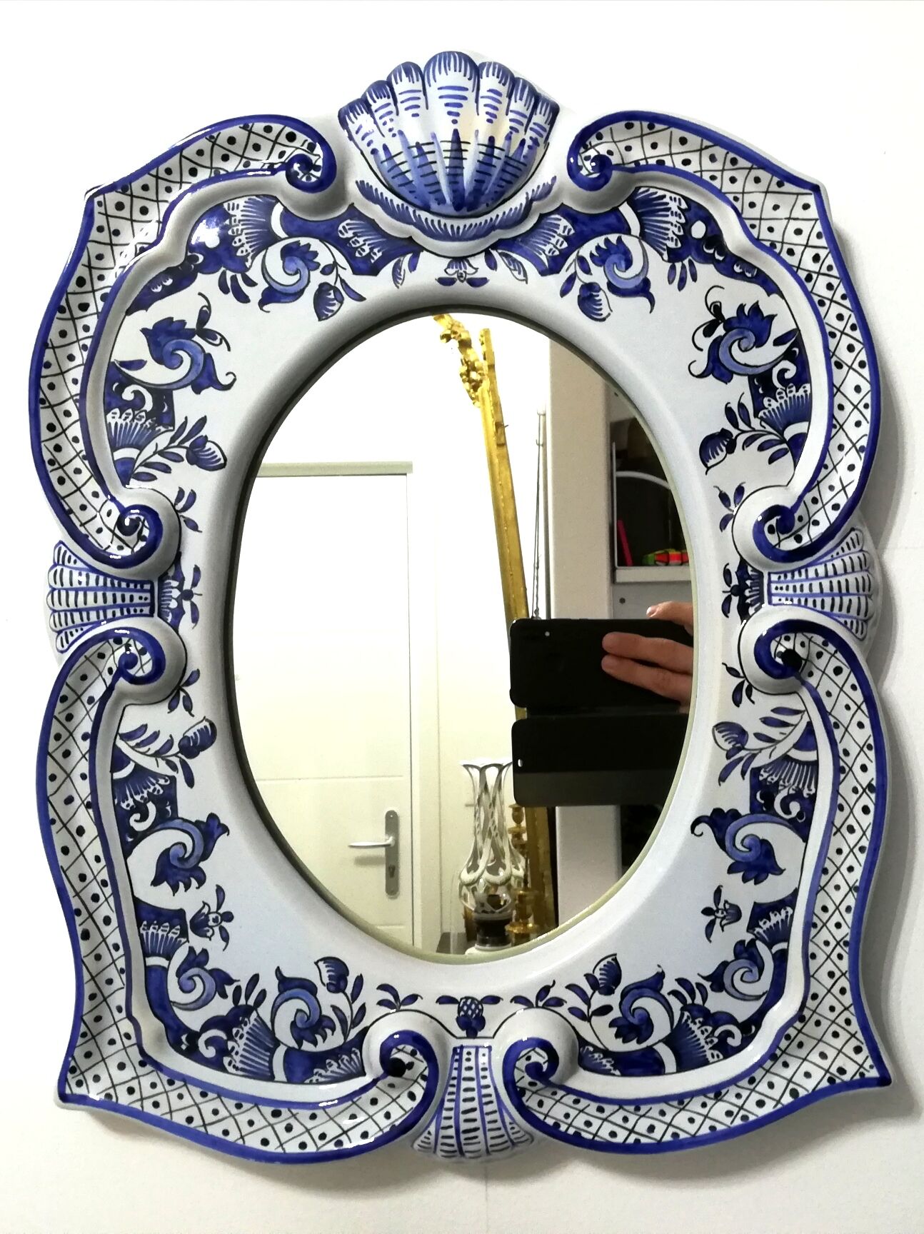 Mirror in old Rouen earthenware