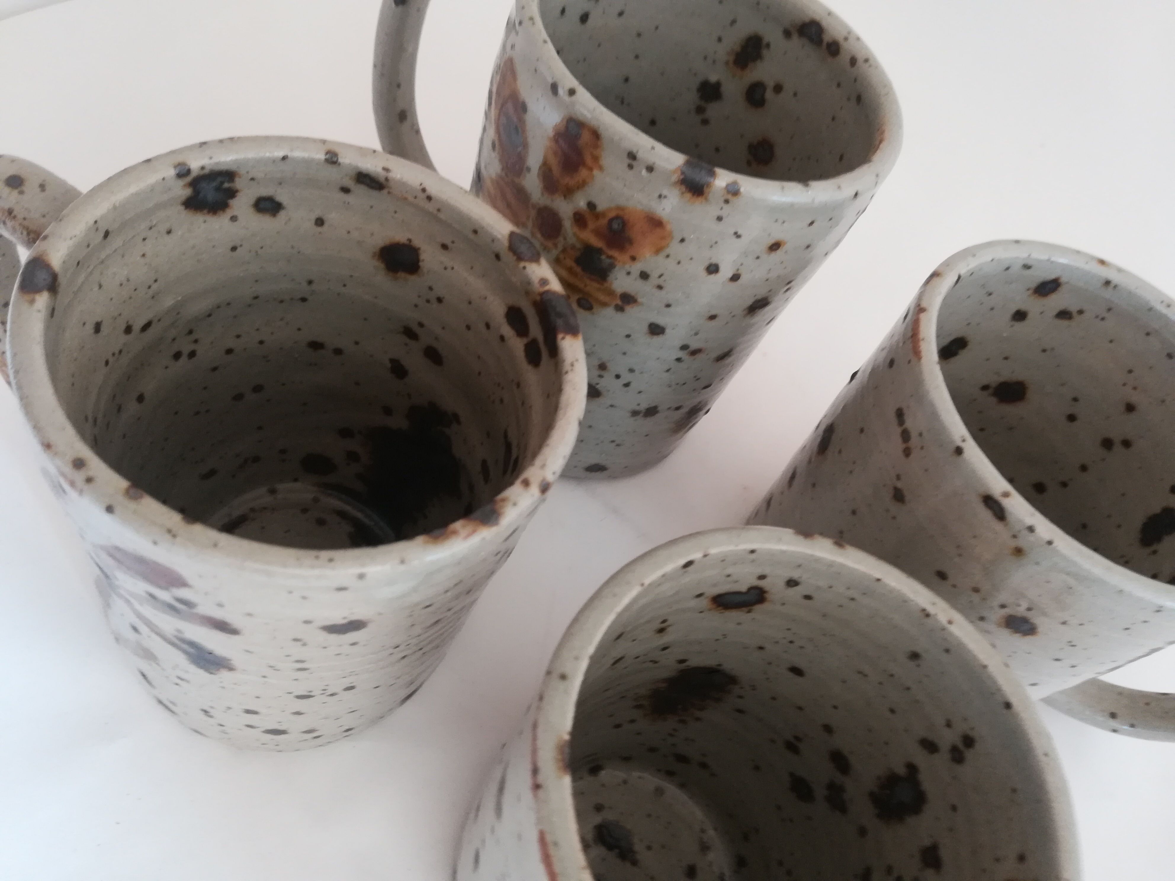 Set of four terracotta mugs