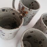 Set of four terracotta mugs