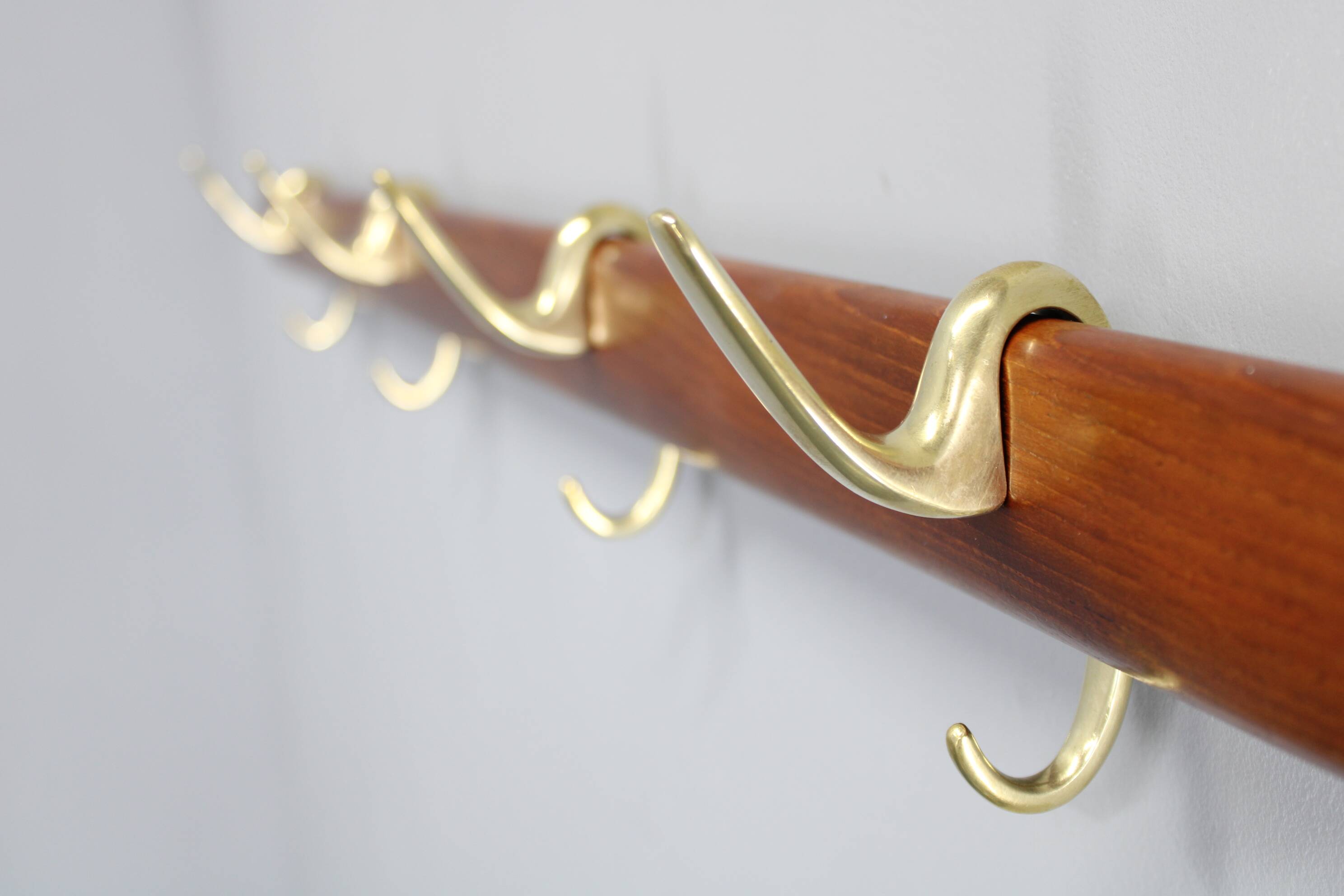 Brass and teak coat hanger by Carl Auböck for Illums Bolighus, Denmark, 1950s