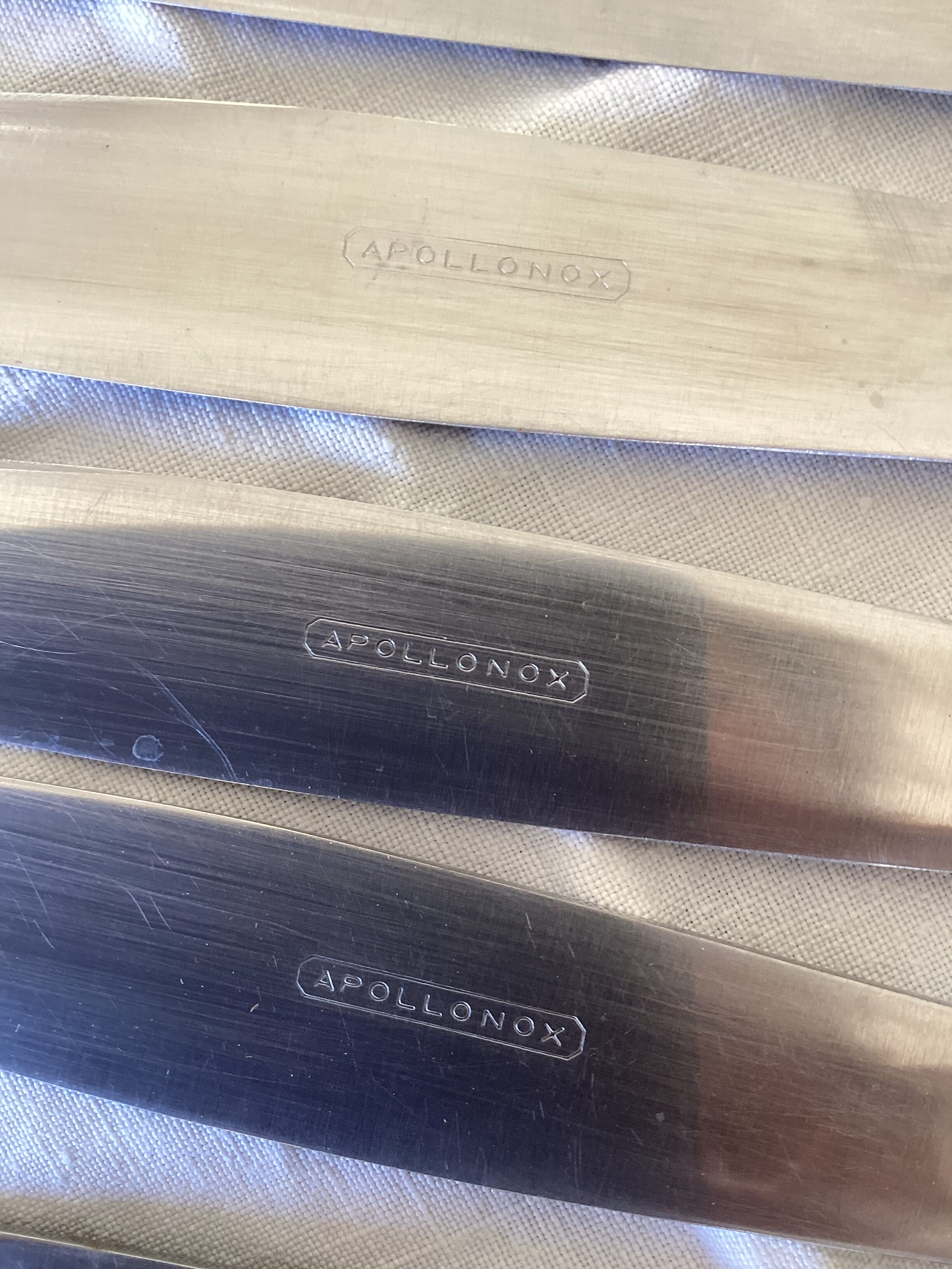 Set of 11 Apollonox table knives in a box