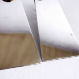 Pair of brass and chrome-plated metal candlesticks