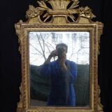Louis XVI period mirror in gilded carved wood