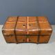 Antique brown travel case with wooden slides from the early 1900s