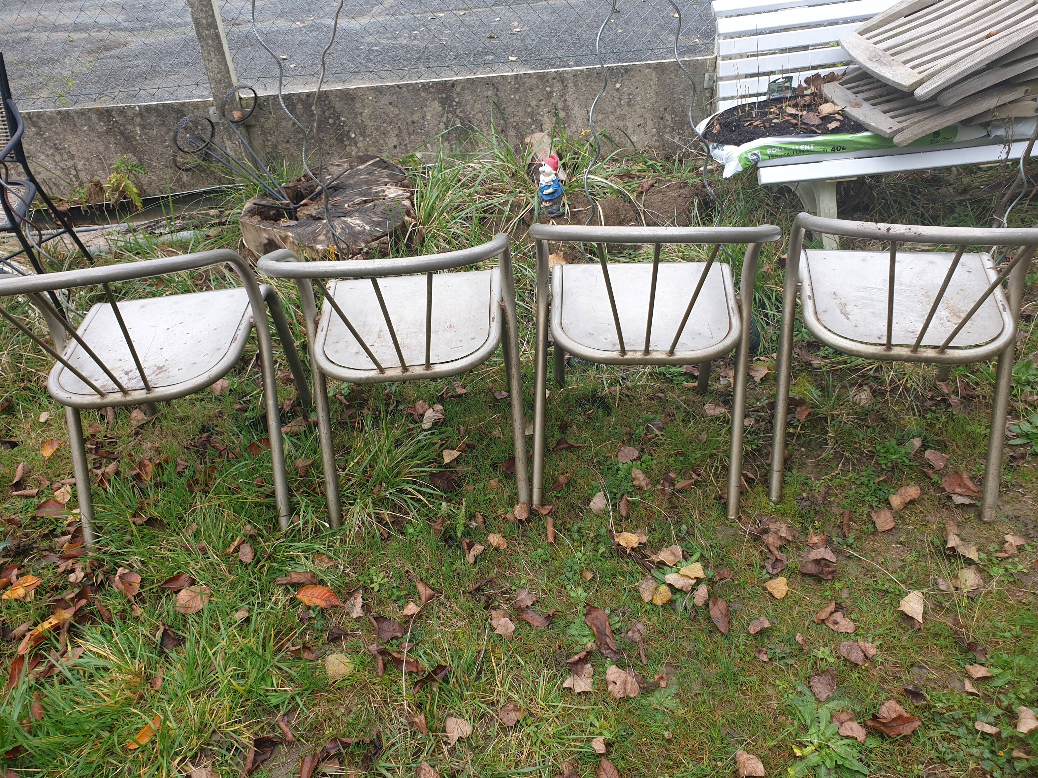 4 seventies welded tubular steel armchairs