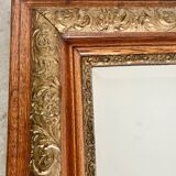Old mirror in oak and gilded wood early 20th century beveled glass