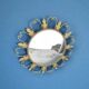 Circular gold metal mirror with floral decoration – 1960s