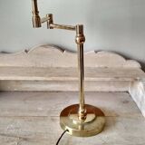 Large golden brass lamp with a movable arm - adjustable desk lamp