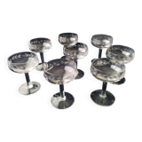 8 vintage glass champagne coupes with an engraved frieze decoration.