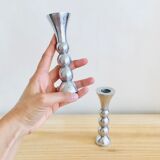 Pair of vintage cast aluminum candle holders