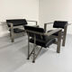 Brutalist living room with faux metal armchairs designed by Karl Friedrich Forster