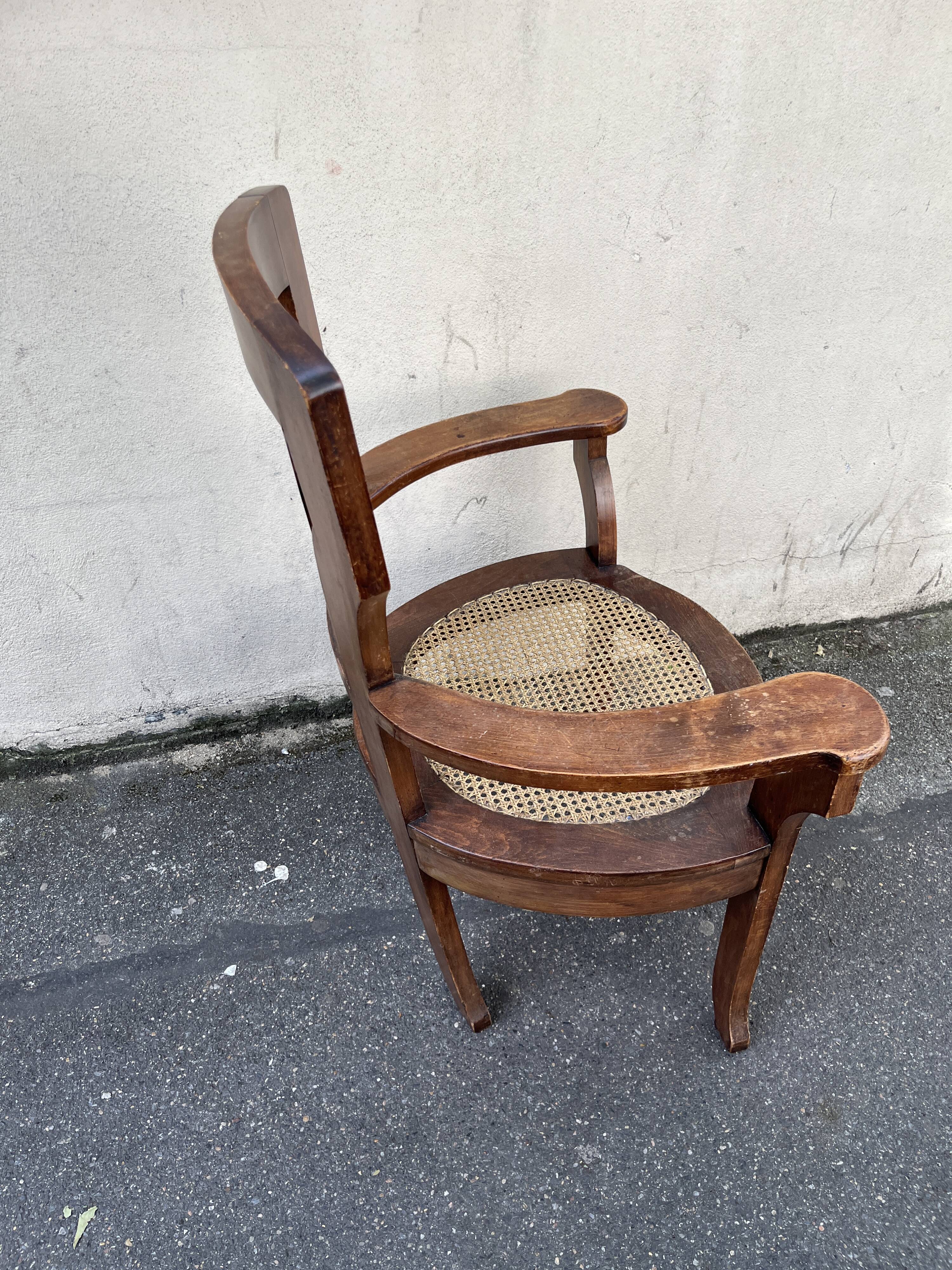 Large caned armchair