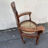 Large caned armchair