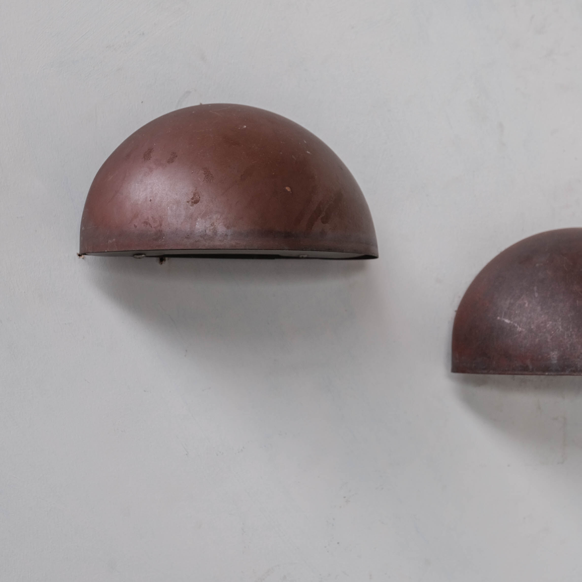 Pair of danish copper patinated wall lights