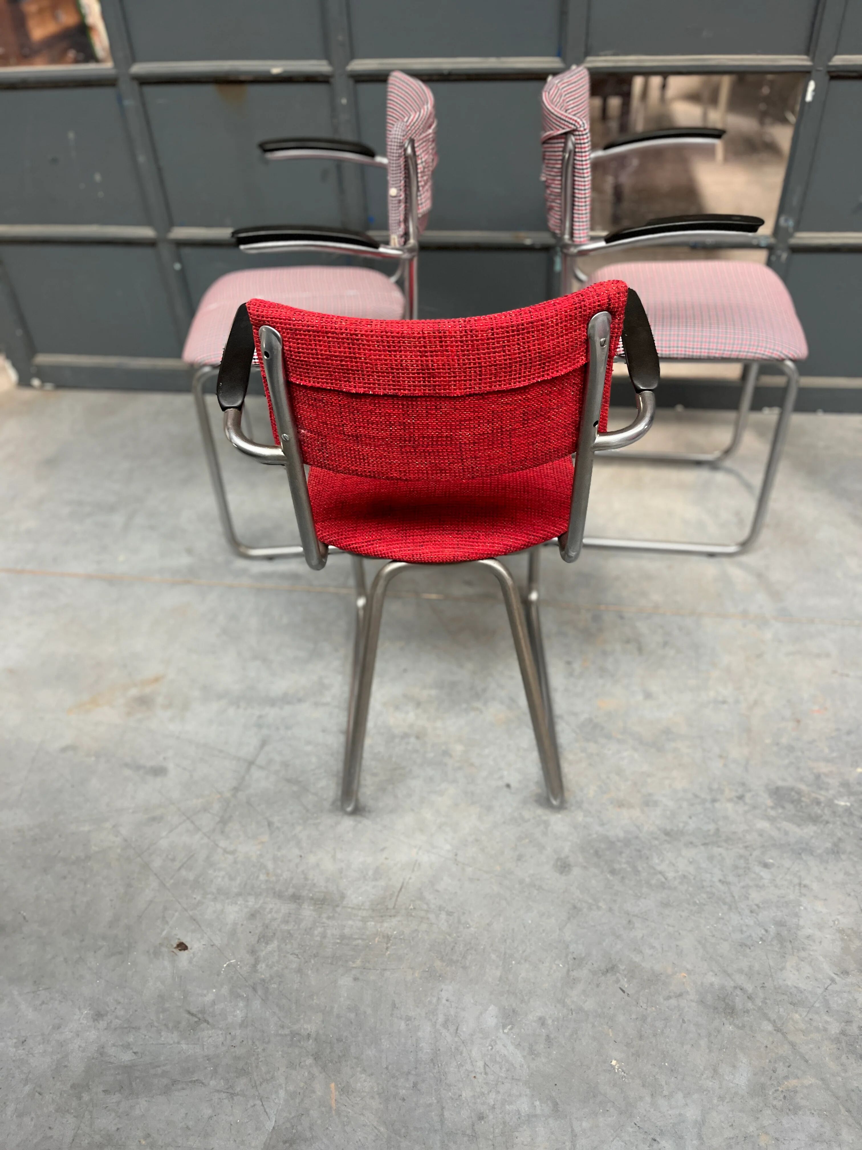 Set of 3 vintage cantilever chairs reupholstered.