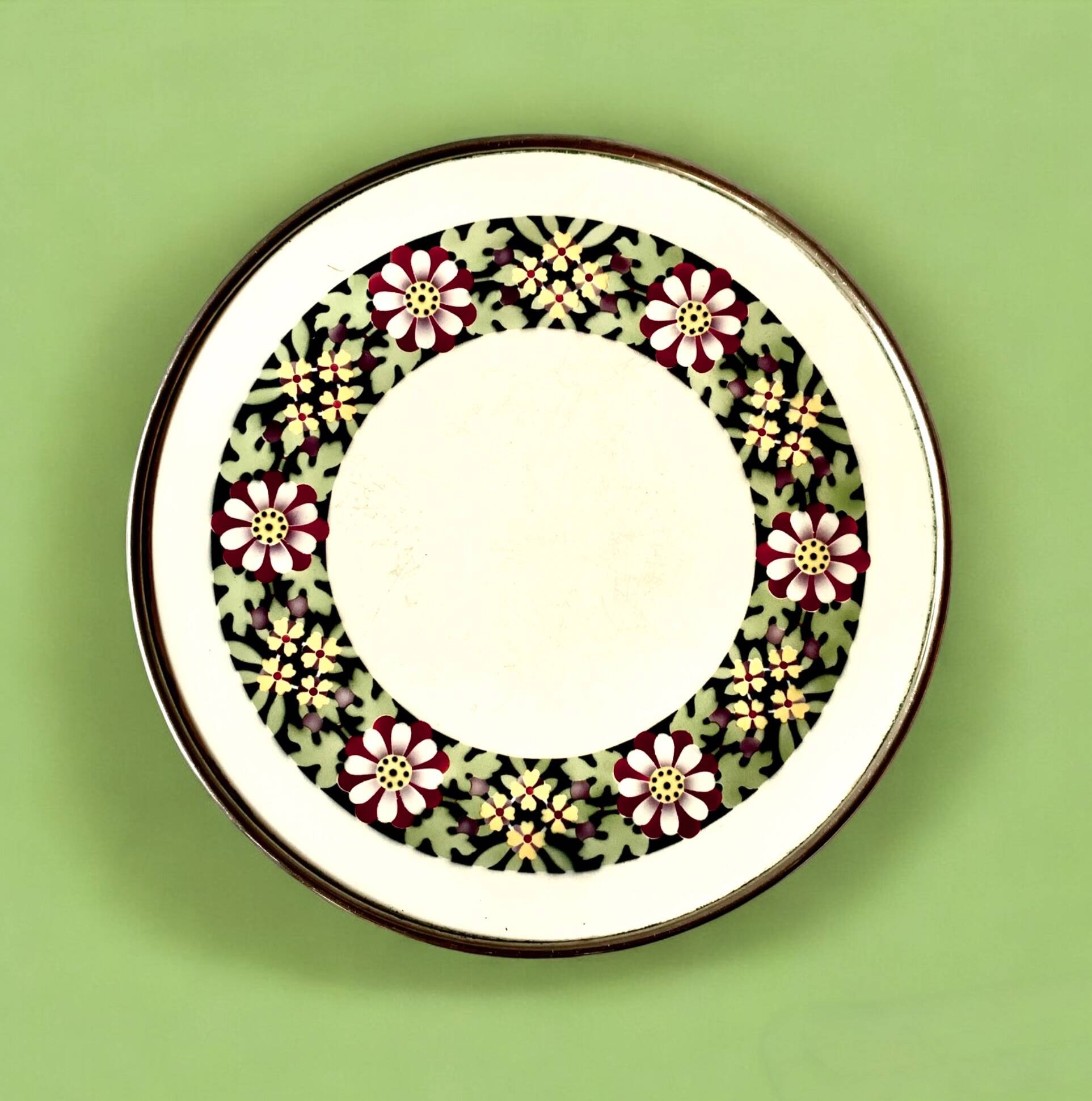 Antique ceramic trivet - floral decoration