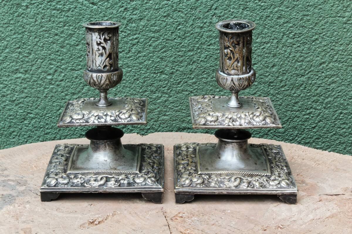 Pair of square candlesticks in patinated bronze