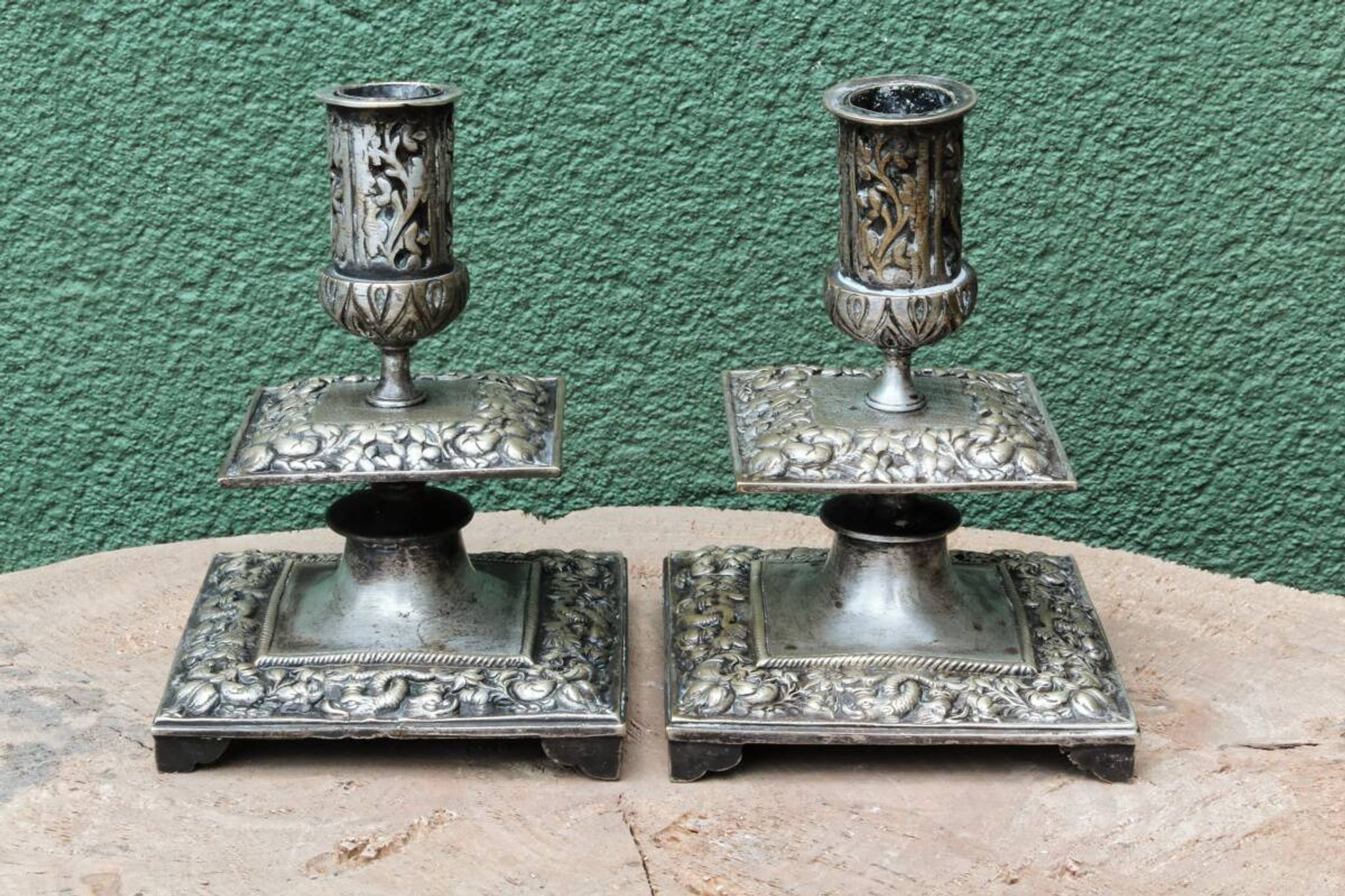 Pair of square candlesticks in patinated bronze