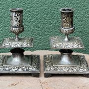 Pair of square candlesticks in patinated bronze