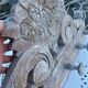 Raw carved wood coat rack