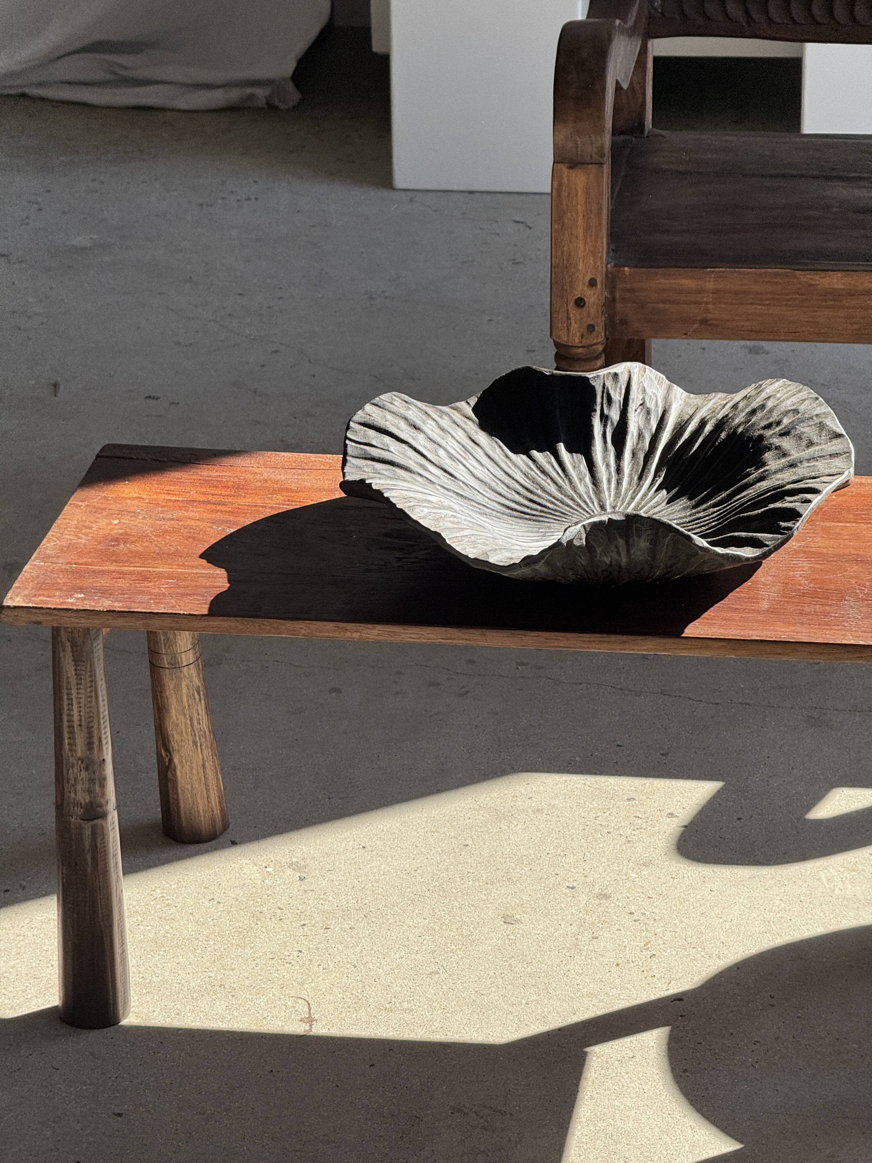 Black solid mango side table (monoxyle) with conical legs