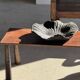 Black solid mango side table (monoxyle) with conical legs