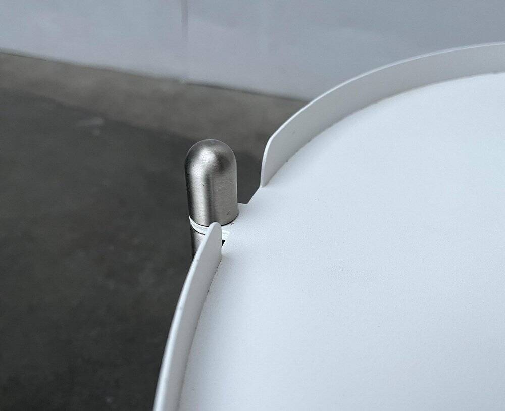 Minimalist Thrill metal coffee table or side table with wheels by Leitmotiv.