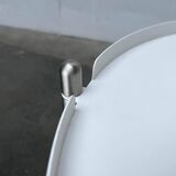 Minimalist Thrill metal coffee table or side table with wheels by Leitmotiv.