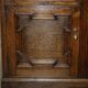 Jacobean Revival library in carved oak