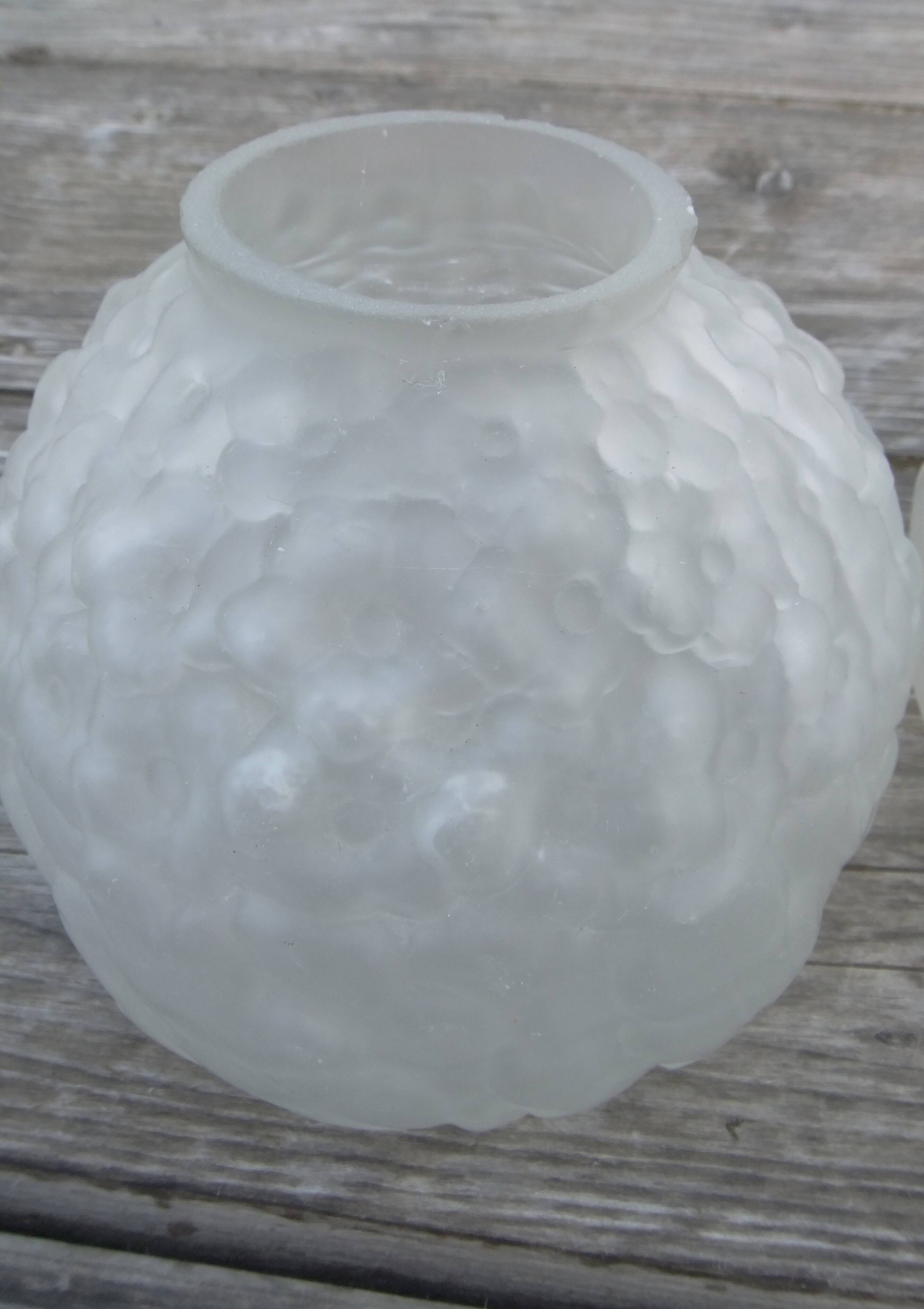 Art Deco ball vase pair with flower and leaf decor